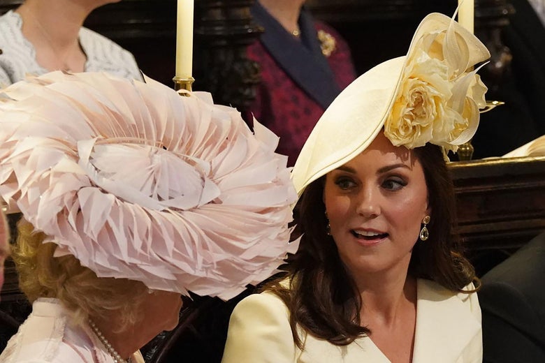 (L-R) Britain's Camilla, Duchess of Cornwall, Britain's Catherine, Duchess of Cambridge, Britain's Prince Andrew, Duke of York and Britain's Princess Beatrice of York wait in the chapel ahead of the wedding ceremony of Britain's Prince Harry, Duke of Sussex and US actress Meghan Markle in St George's Chapel, Windsor Castle, in Windsor, on May 19, 2018. (Photo by Jonathan Brady / POOL / AFP) (Photo credit should read JONATHAN BRADY/AFP/Getty Images)